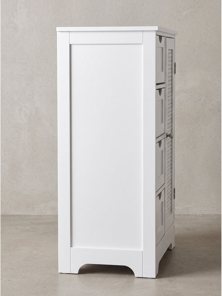 Seitenprofil des platzsparenden weißen MDF-Badschranks mit elegant geschwungenem Fußteil auf glattem Stein._