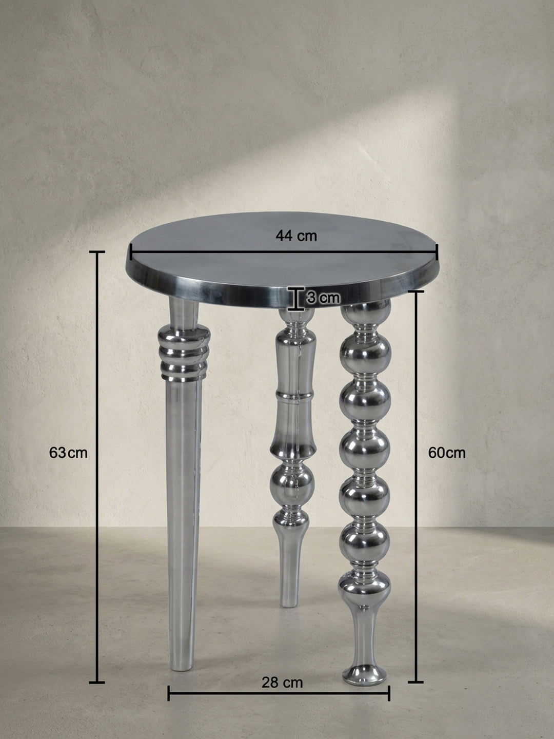 Technisches Maßbild des runden Beistelltisches mit den exakten Abmessungen: 44 cm Durchmesser und 63 cm Höhe, ideal für die Raumplanung._