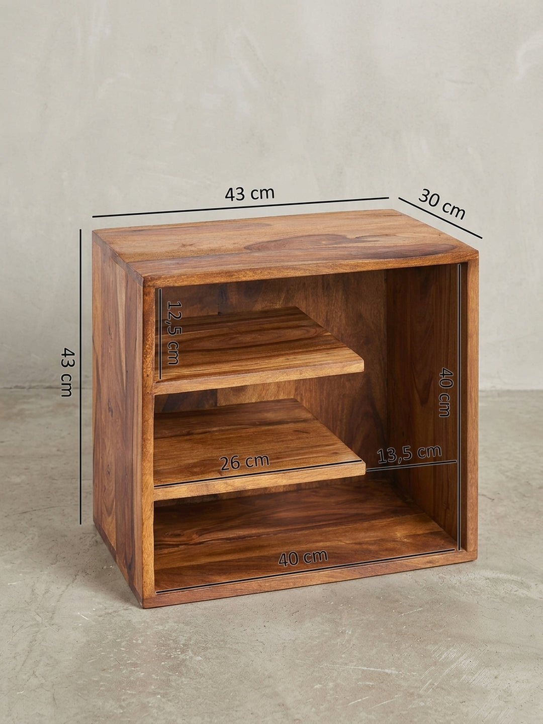 Rückwärtige Detailansicht des massiven Holztisches, zeigt die saubere, bündige Verarbeitung der Kanten und die natürliche, lebhafte Farbvariation des indischen Rosenholzes._