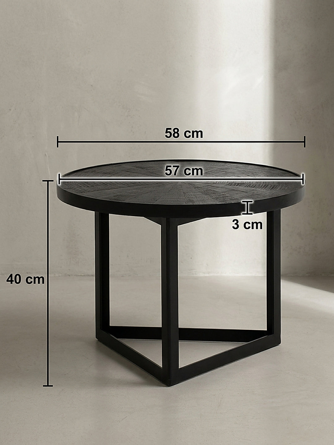 Maßskizze des schwarzen Couchtisches mit exakten Abmessungen von 58 cm Durchmesser und 40 cm Höhe für optimale Raumplanung._