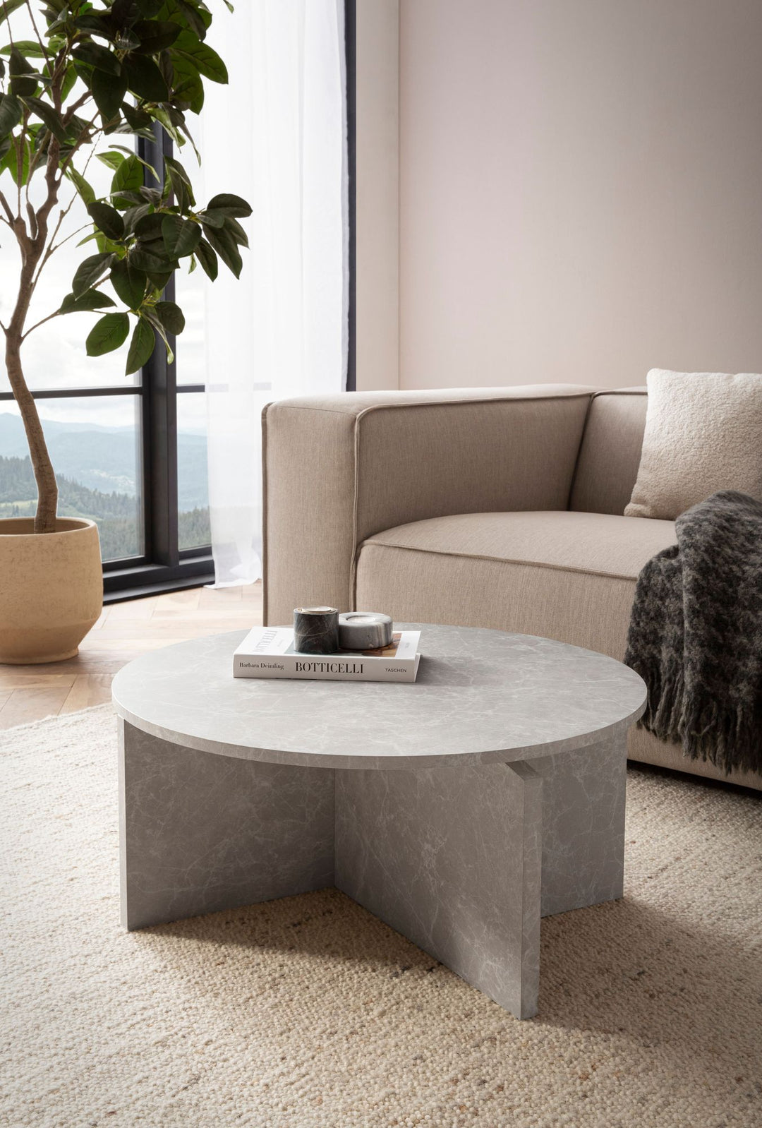 Couchtisch rund in Stein-Optik – modernes Design in Großformat
