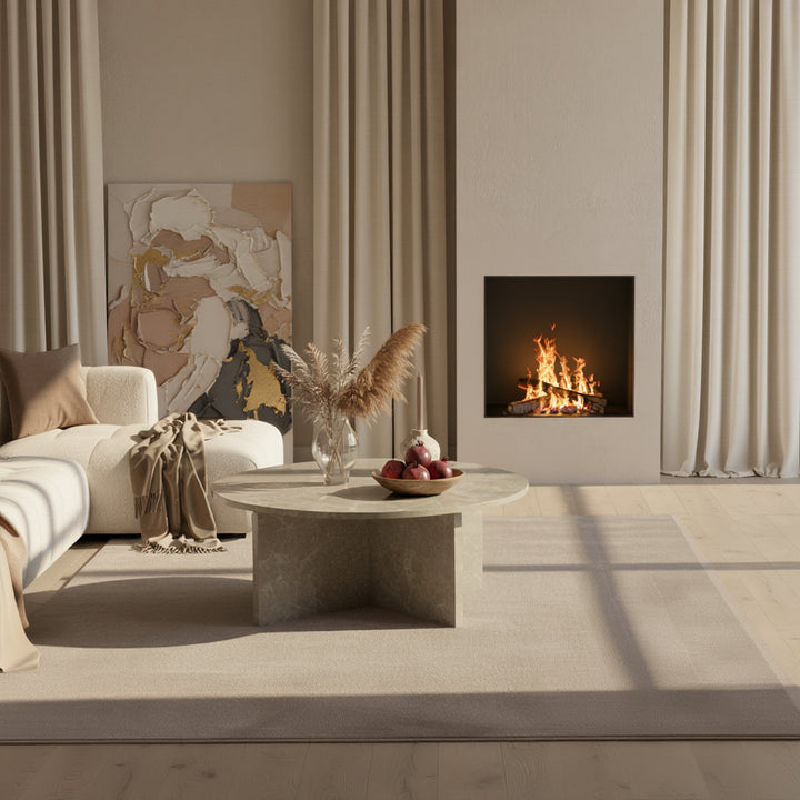 Runder Couchtisch in sandfarbener Stein-Optik mit moderner Oberfläche _