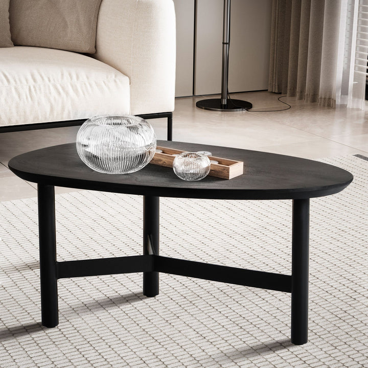 Couchtisch Mango Massivholz in Schwarz, Nierenform, 86x50x37 cm