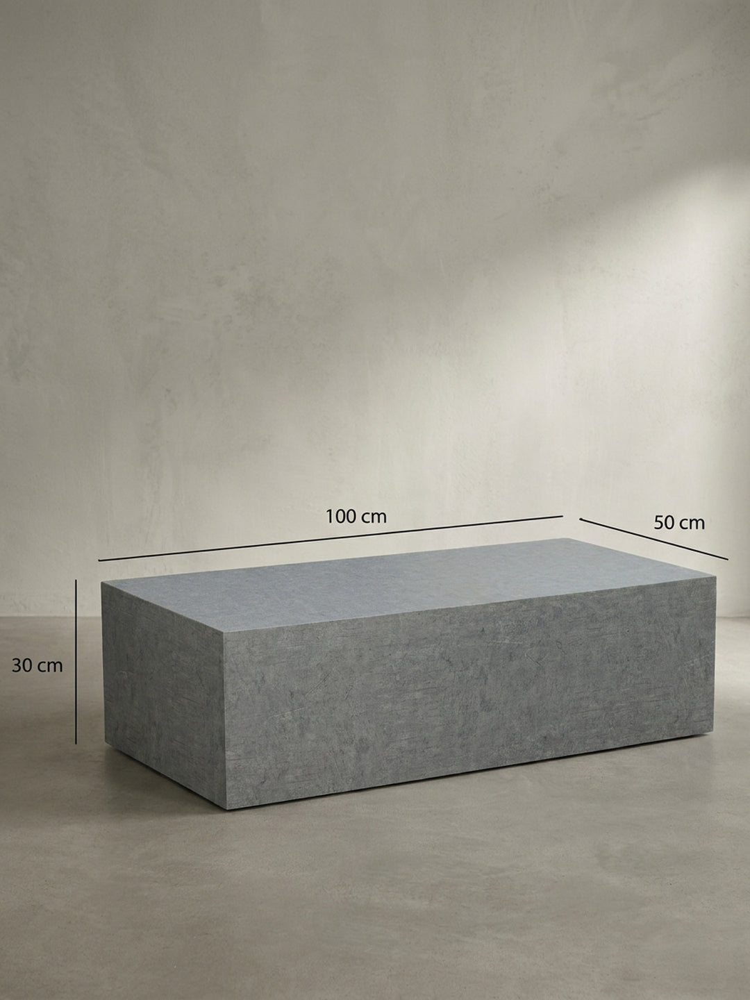 Technische Skizze für den Monoblock-Couchtisch in Beton-Optik mit exakten Maßangaben von 100 cm Länge und 30 cm Höhe._