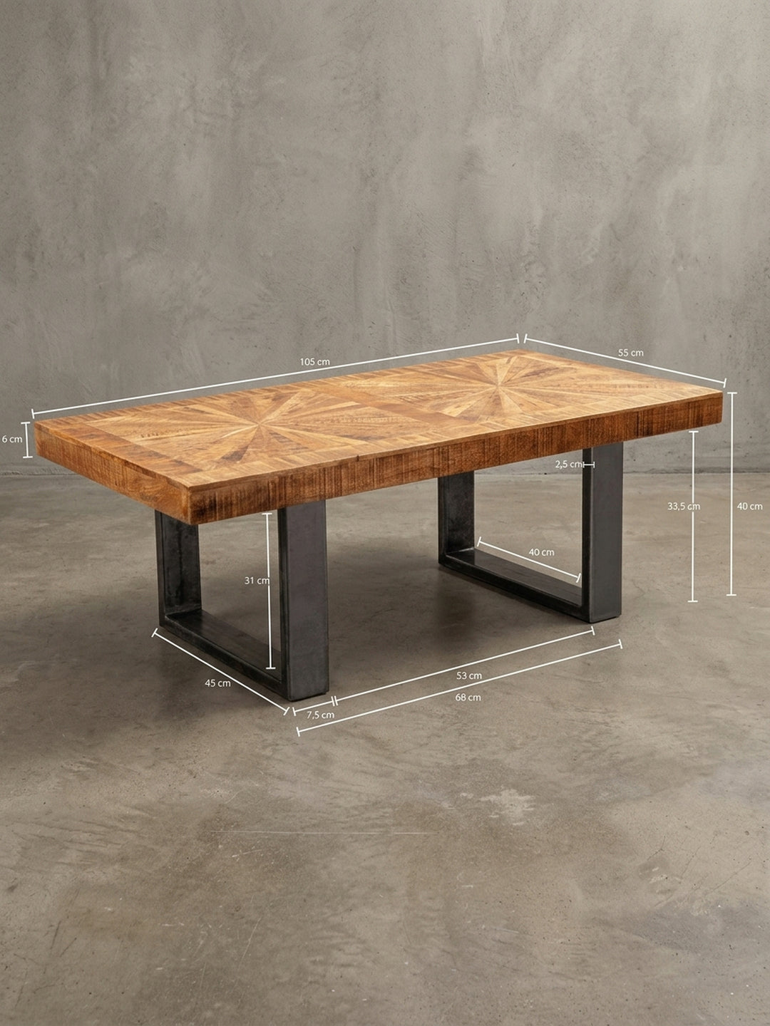Detailansicht der rückseitigen Konstruktion des Sofatisches. Die stabile Verbindung zwischen der 105cm langen Holzplatte und den lackierten Eisenbeinen garantiert eine hohe Belastbarkeit._