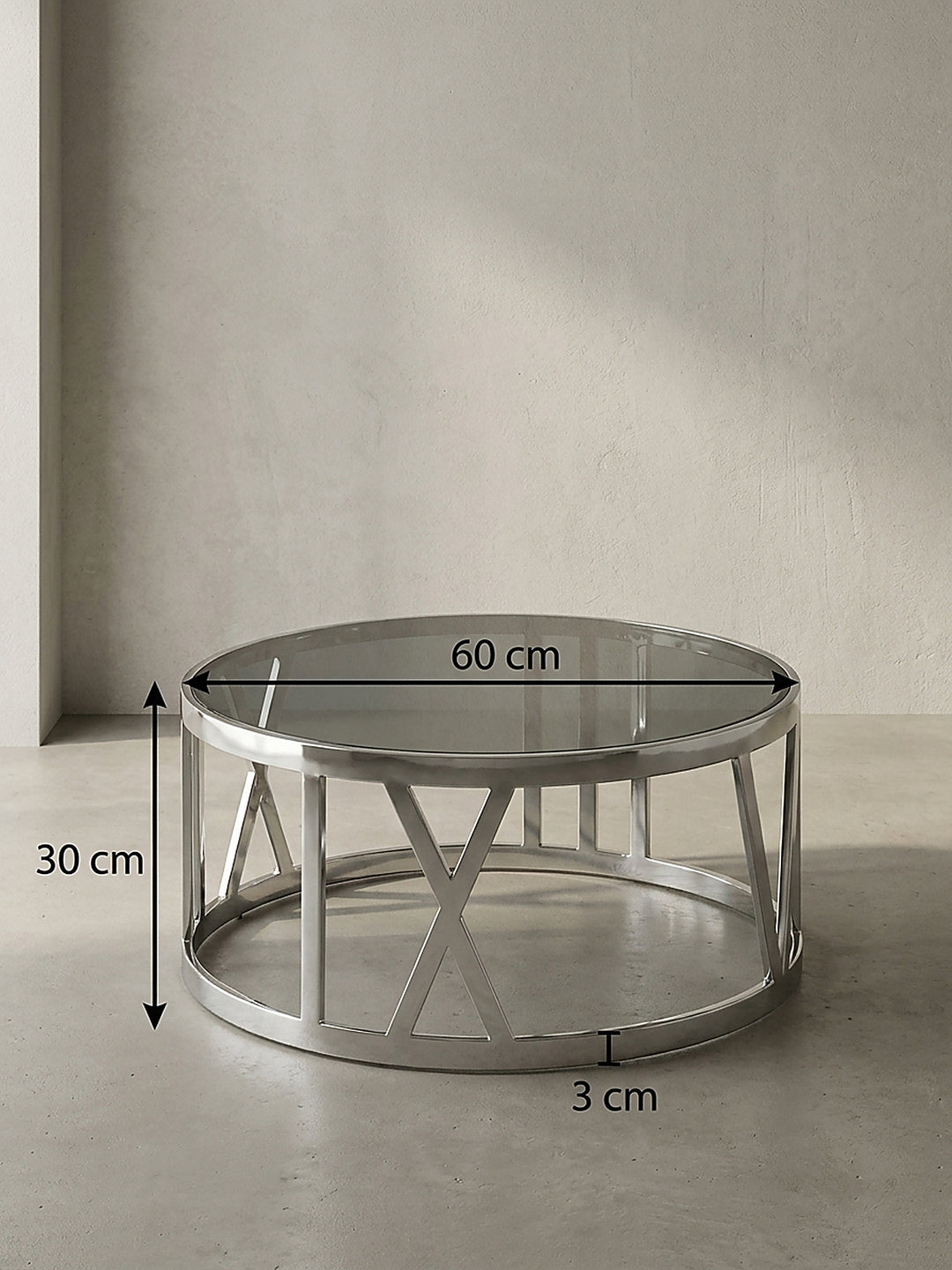 Technische Bemaßung des runden Couchtisches mit Pfeilen für 60 cm Breite, 60 cm Tiefe und 30 cm Höhe zur exakten Raumplanung im Wohnzimmer._