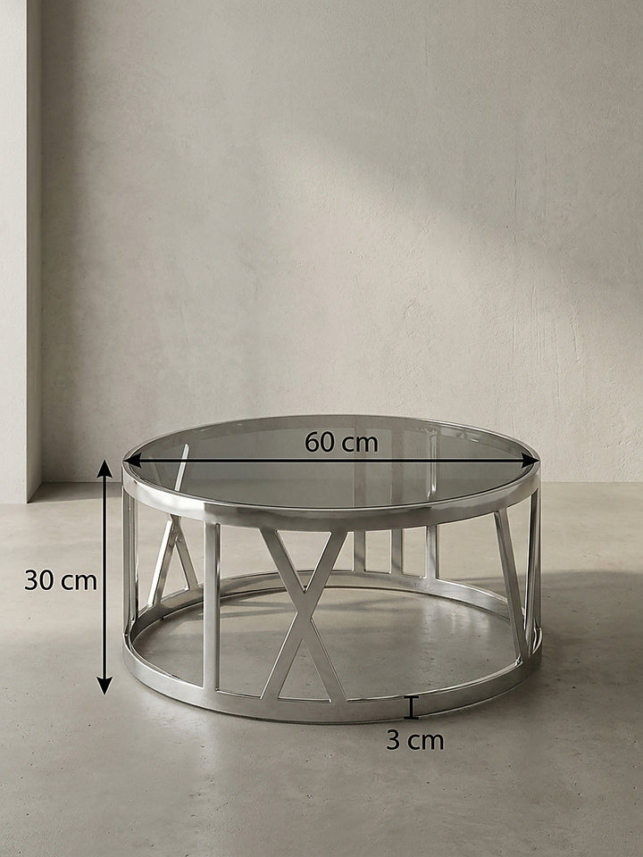 Technische Bemaßung des runden Couchtisches mit Pfeilen für 60 cm Breite, 60 cm Tiefe und 30 cm Höhe zur exakten Raumplanung im Wohnzimmer._