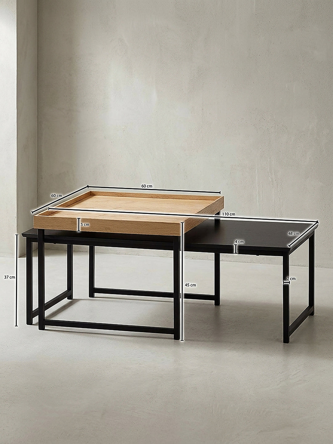 Technische Zeichnung des zweiteiligen Couchtisches mit genauen Maßangaben von 110x60x45 cm für die exakte Raumplanung im großzügigen, modernen Wohnbereich._