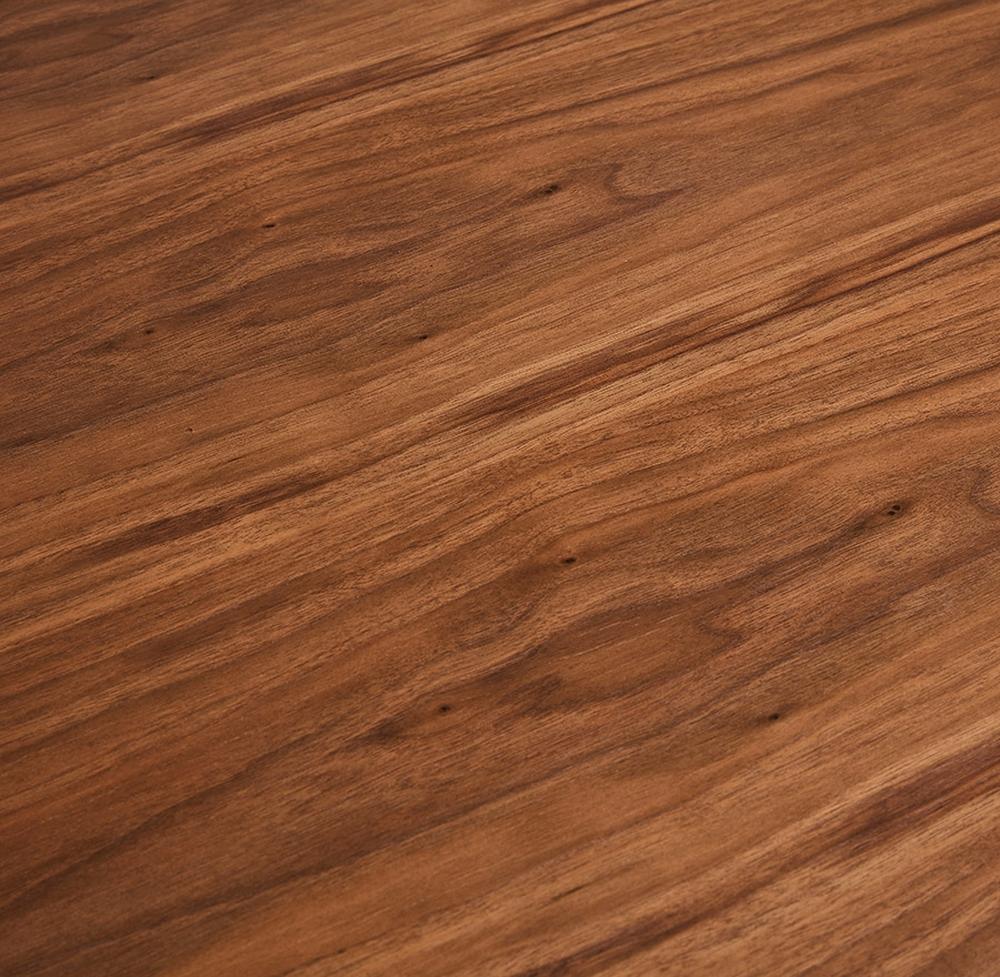 Designer-Esstisch mit brauner Holzplatte und X-förmigen schwarzen Beinen - passend für elegante Innenräume_