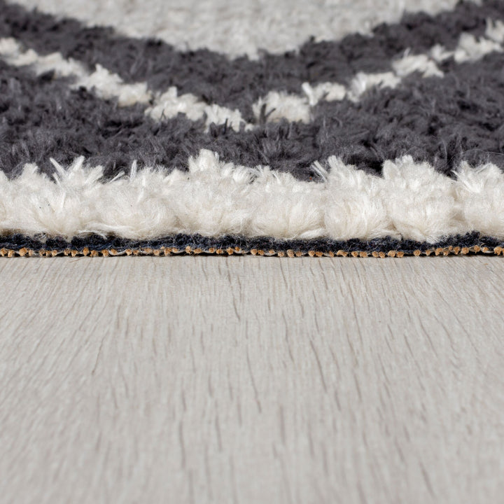 Eleganter SWALE TESS Teppich mit Quasten und Textur - Kadima Design_Schwarz-Beige_#sku_BARK503119372010-BARK503119372011#