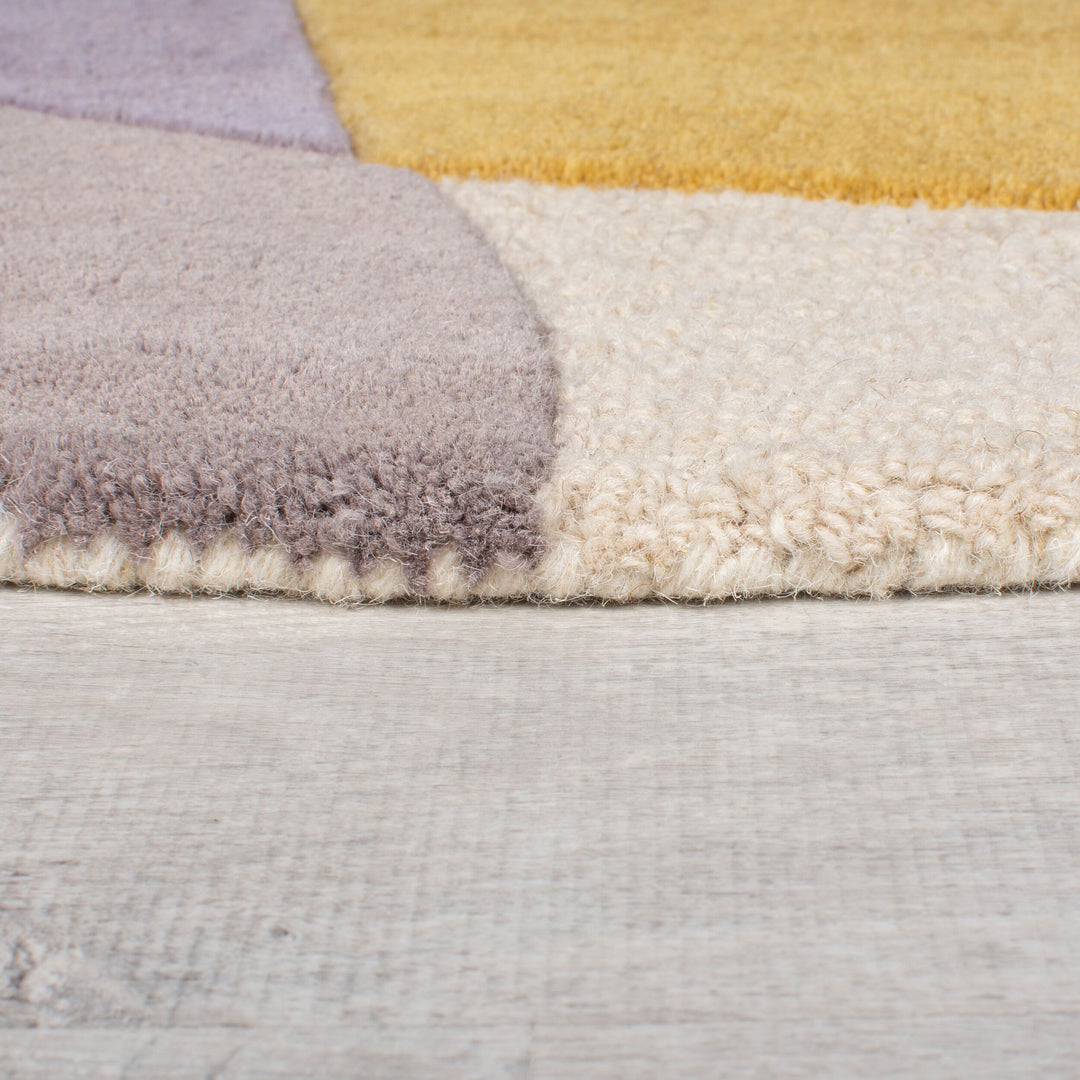 Wollteppich Abstrakt-Design mit farbakzente AIRE_Rund_