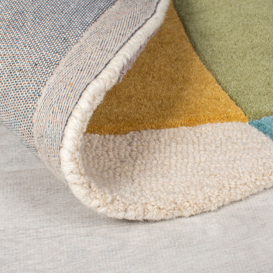Wollteppich mit abstraktem Design &amp; Farbakzenten AIRE_Rund_