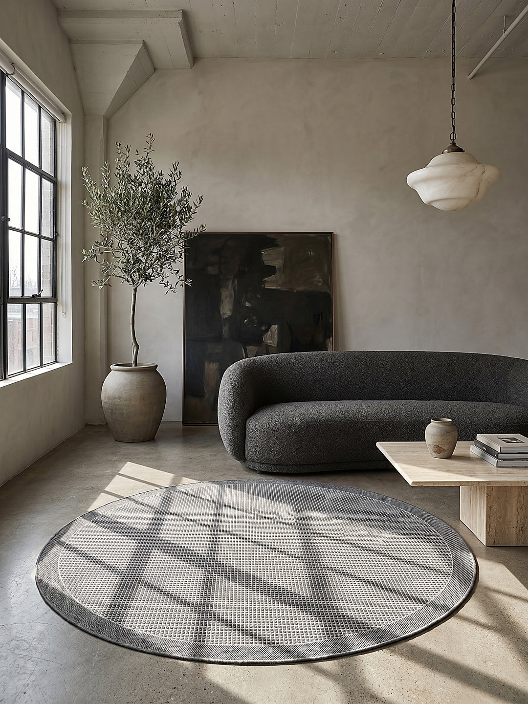 Teppich Grau rund im modernen Wohnzimmer_