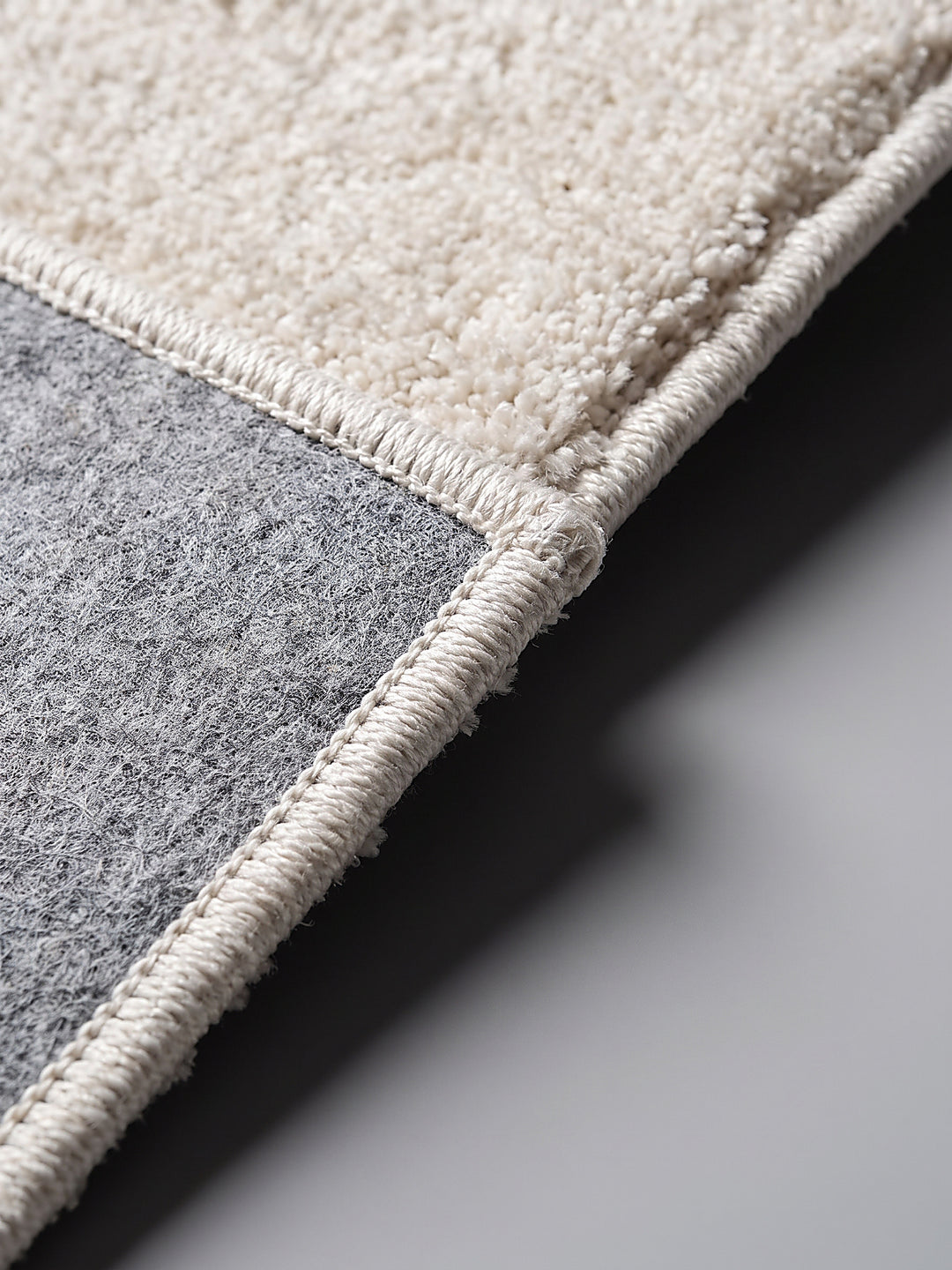 Teppich Creme Kante Verarbeitung_