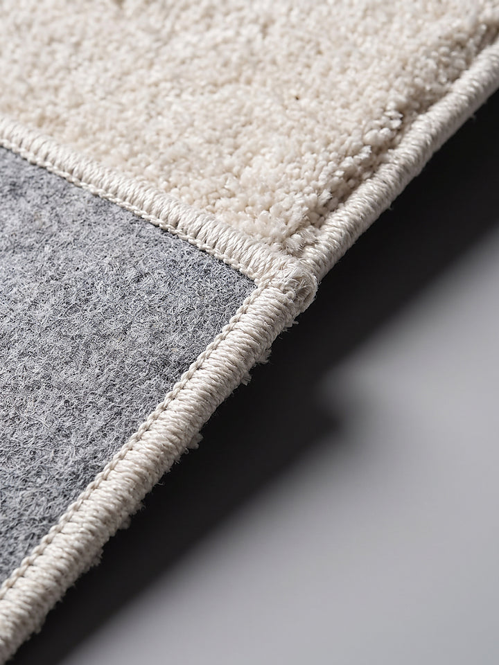 Teppich Creme Kante Verarbeitung_