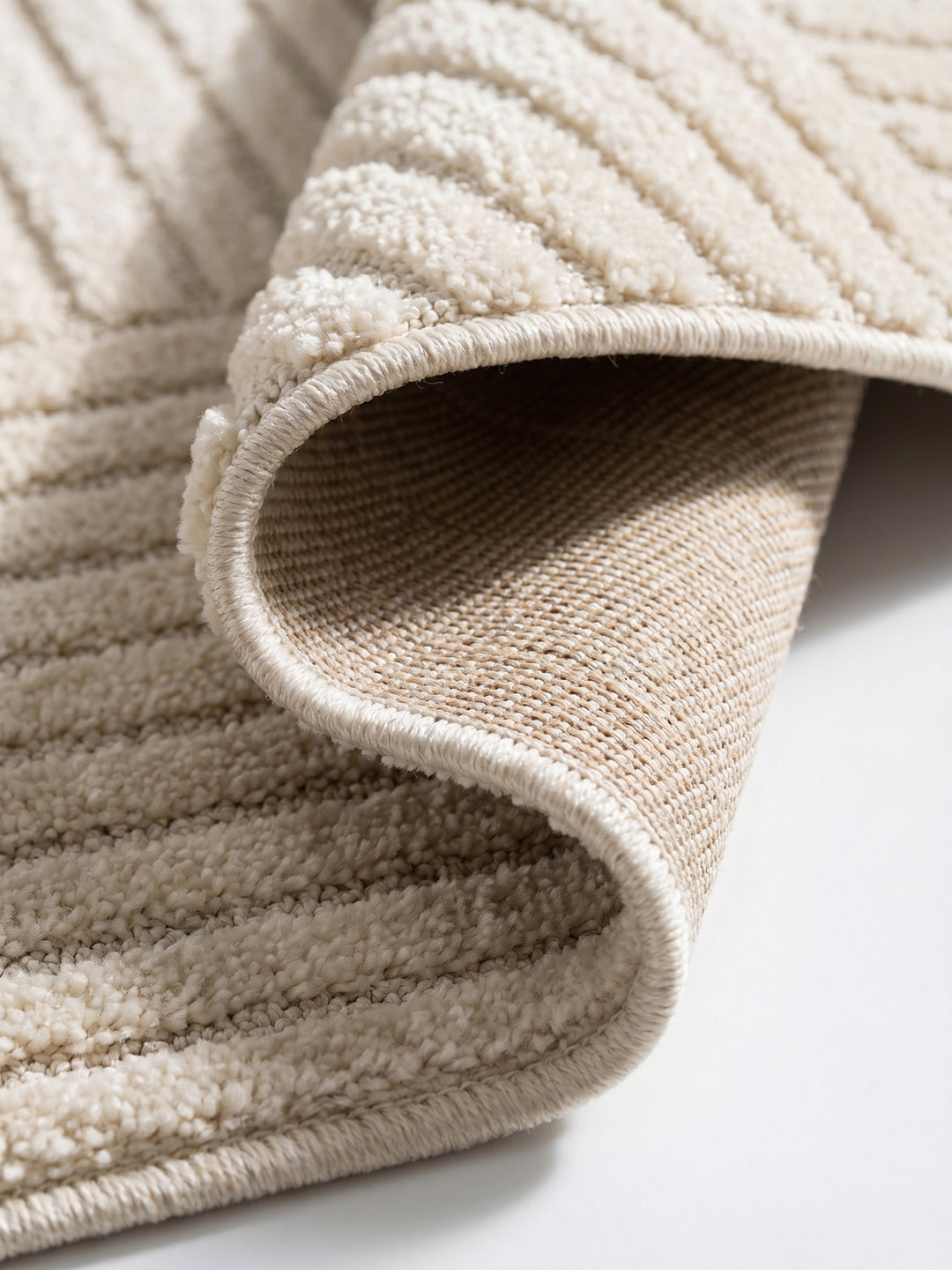 Teppich Creme rund Kante Rückseite_