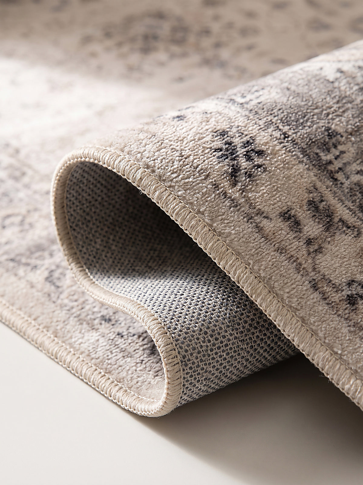 Teppich Beige-Grau Kante Verarbeitung