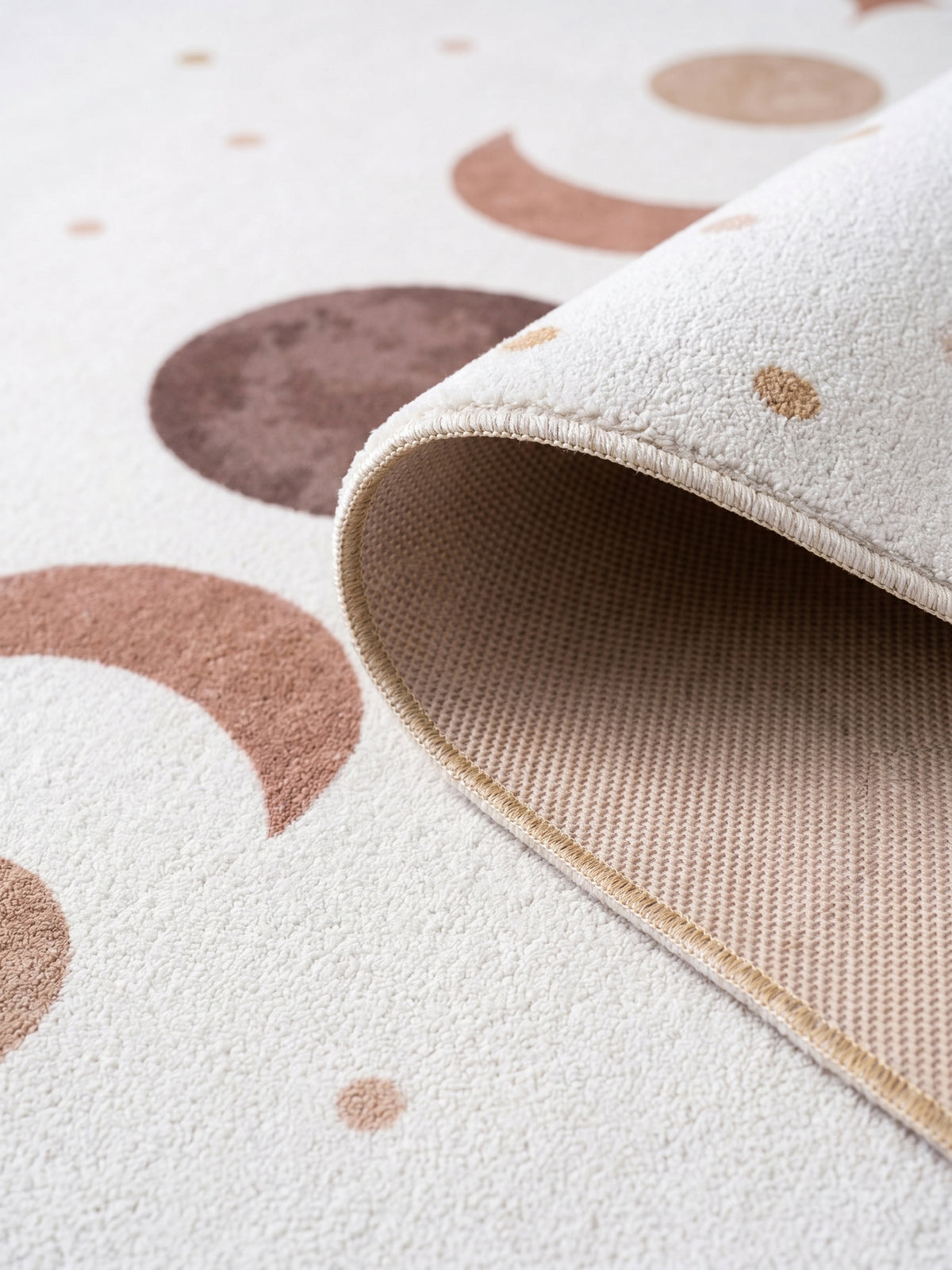 Teppich Creme rund Kante Rückseite