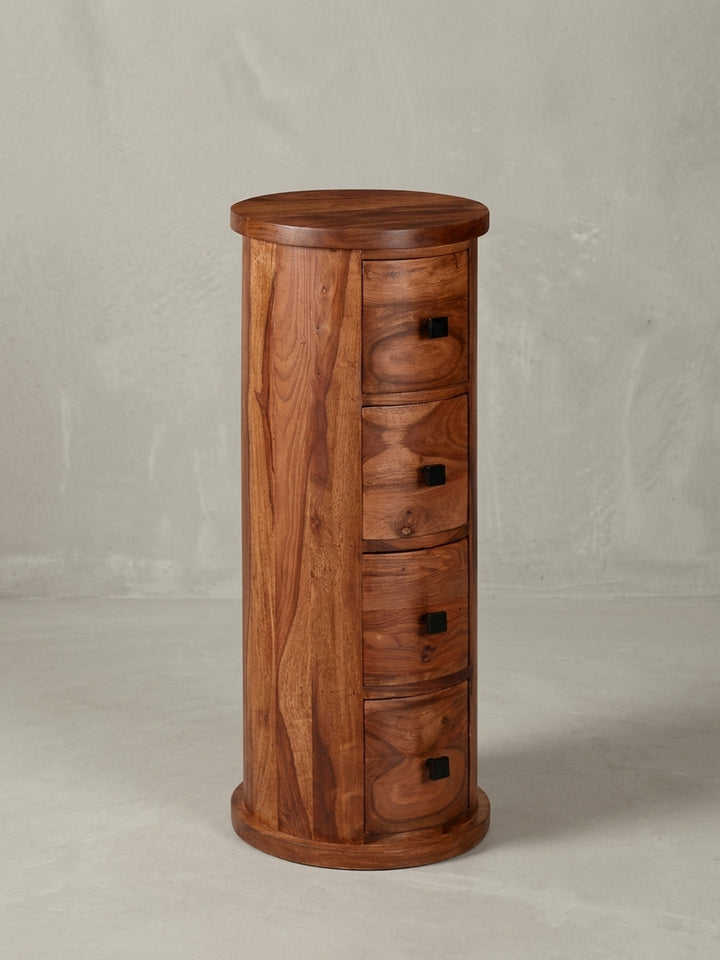 Seitenansicht des schmalen Schranks, die durchgehende zylindrische Silhouette und die Höhe von 85 cm aus Massivholz hervorhebend._
