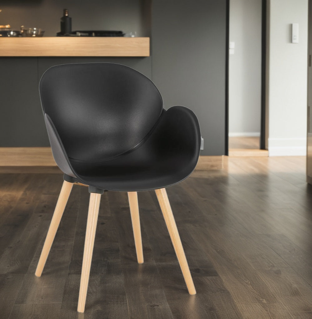 Eleganter Küchenstuhl Schwarz mit ergonomischer Sitzschale aus Polypropylen von Kadima Design_