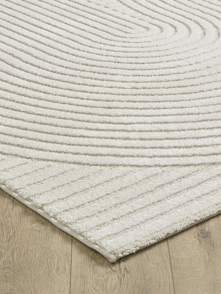 Teppich Kurzflor Creme geometrisch aus Polyester im Wohnraum aus der CETINA Kollektion_