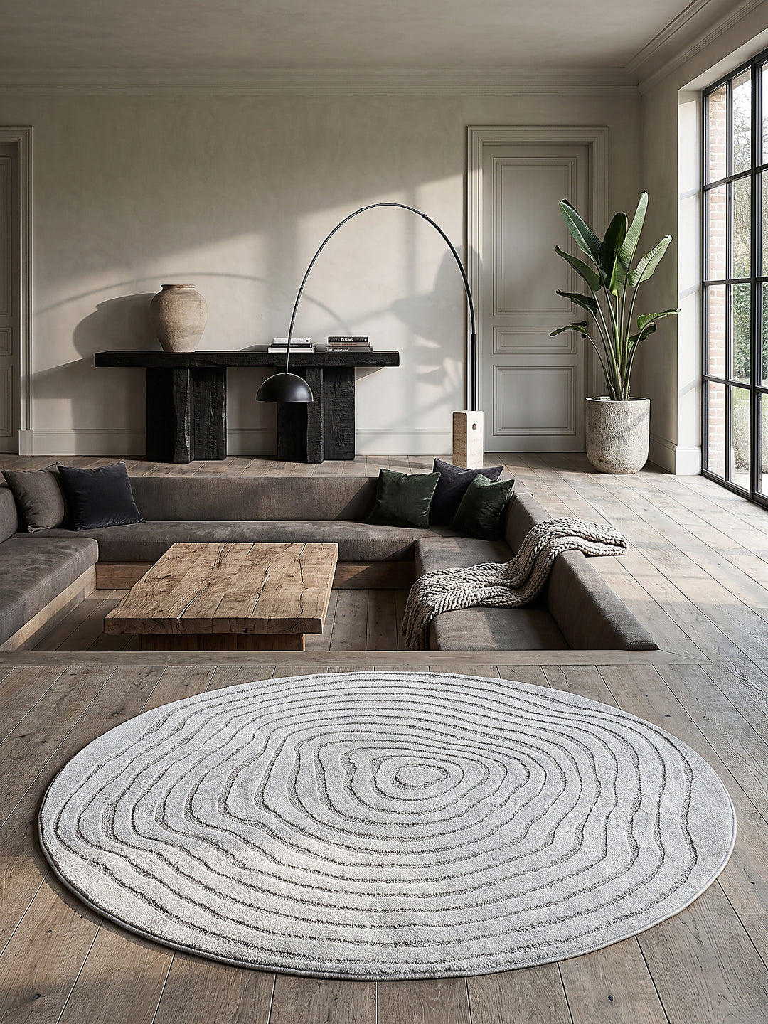 Teppich Grau rund im modernen Wohnzimmer_