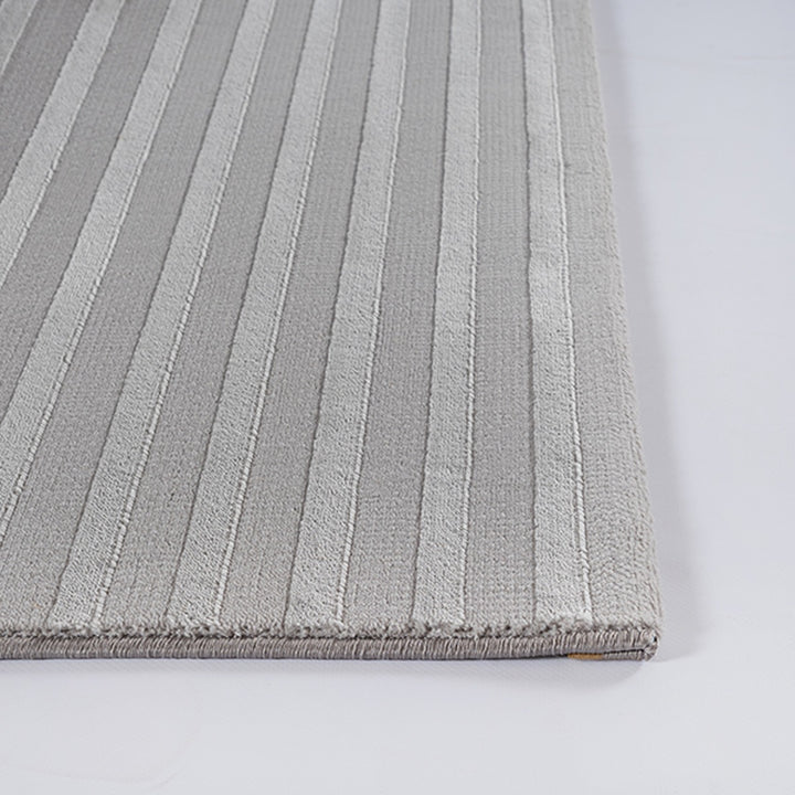 Kurzflorteppich Grau Geometrisch als Blickfang der Raumgestaltung aus Polyester ERESMA Serie_