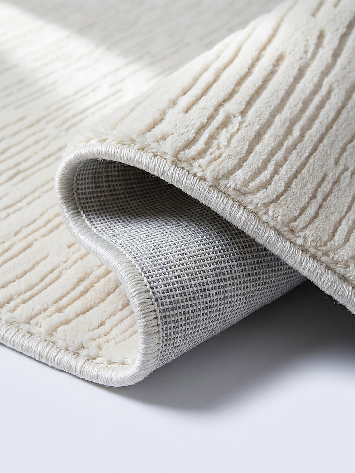 Teppich Creme Kante Verarbeitung_