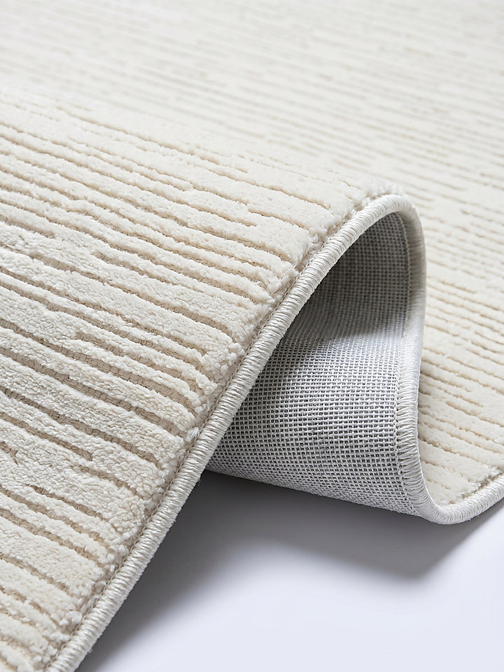Teppich Creme Kante Verarbeitung_