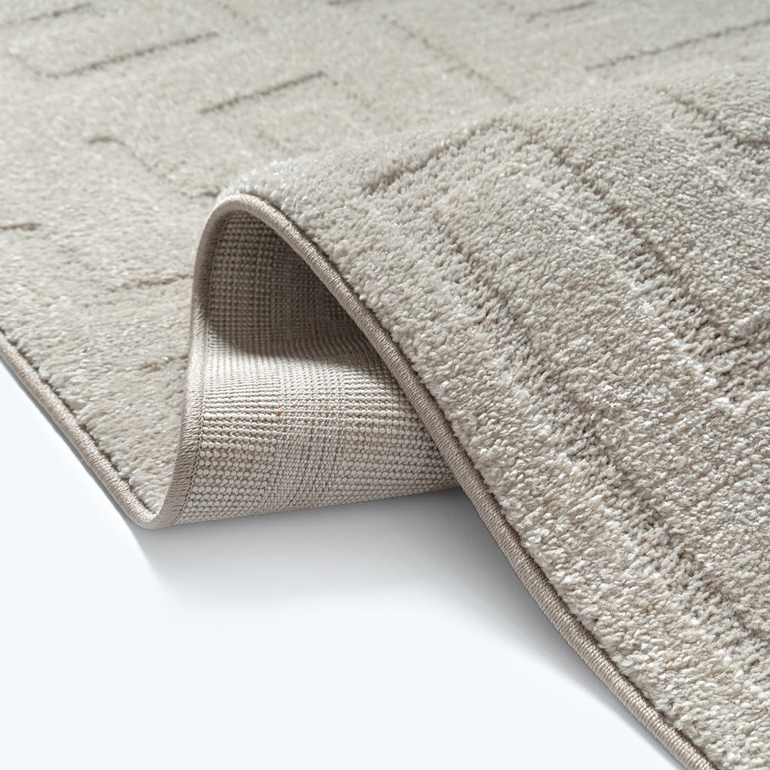 Teppich Kurzflor Beige als minimalistische Wohnidee aus Polyester aus der MUOTA Kollektion_