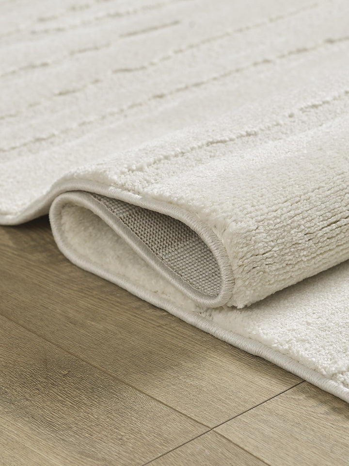 Teppich Kurzflor Creme abstrakt aus Polyester für puristische Einrichtung CETINA Serie_