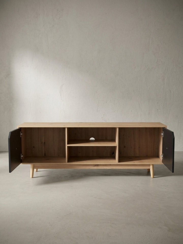 Blick auf die soliden Eichenholzbeine des Fernsehboards, die für einen sicheren Stand und 15 cm Bodenfreiheit sorgen._
