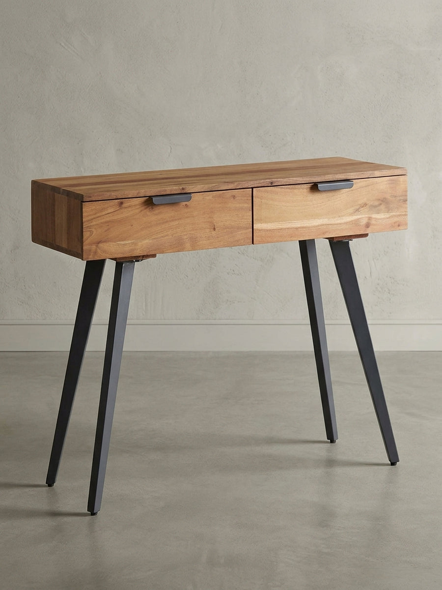 Moderner Konsolentisch aus massivem Akazienholz mit schwarzen Metallbeinen und zwei Schubladen, freigestellt auf weißem Hintergrund._