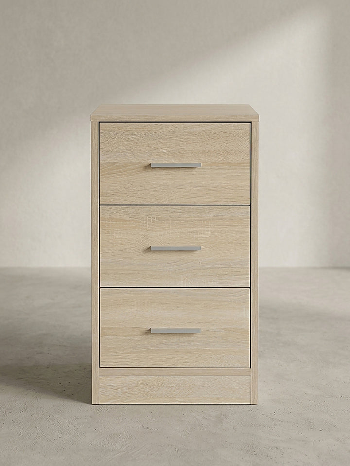 Halbseitige Ansicht der 68 cm hohen Nachtkonsole im modernen Design mit silberfarbenen Griffen und stabilen Kunststofffüßen._
