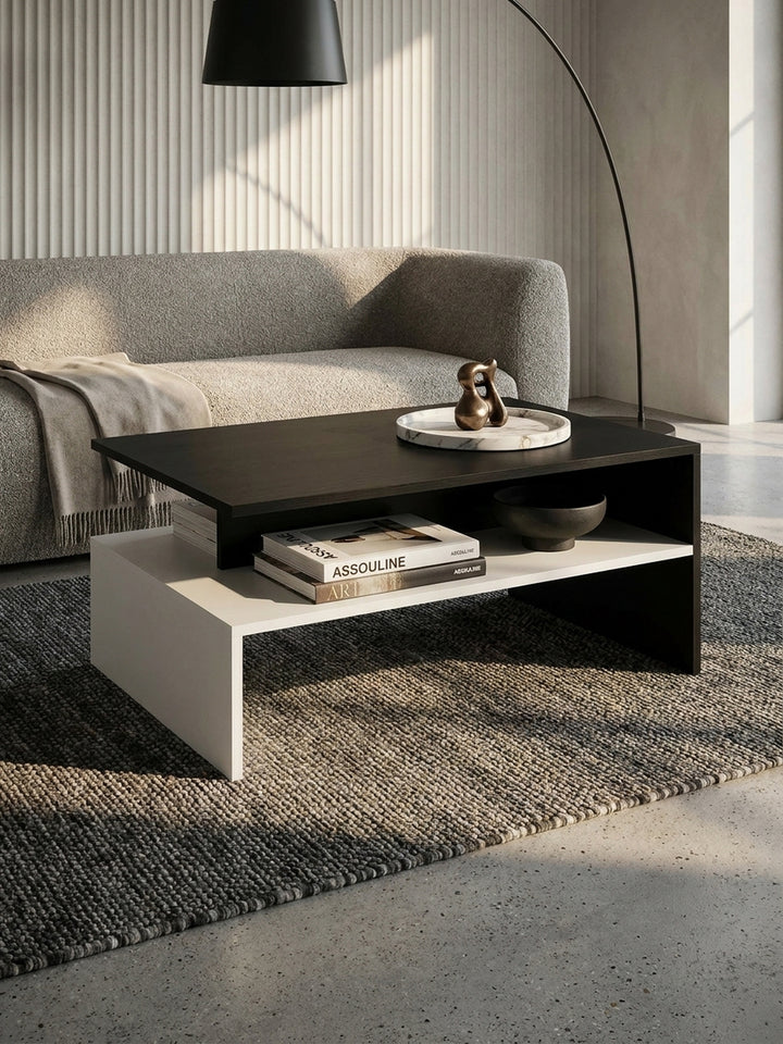 Detailaufnahme der matten Oberfläche des Couchtischs in Schwarz und Weiß mit kratzfester Melaminbeschichtung und geraden Kanten_