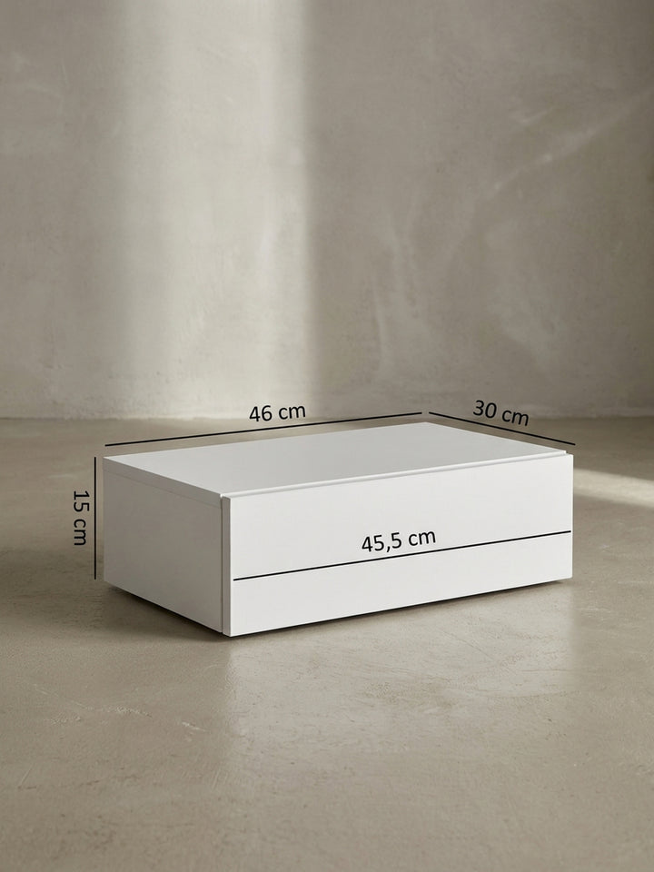 Maßskizze des weißen Nachttisches mit exakten Abmessungen von 46 cm Breite, 15 cm Höhe und 30 cm Tiefe für die präzise Planung an der Wand_