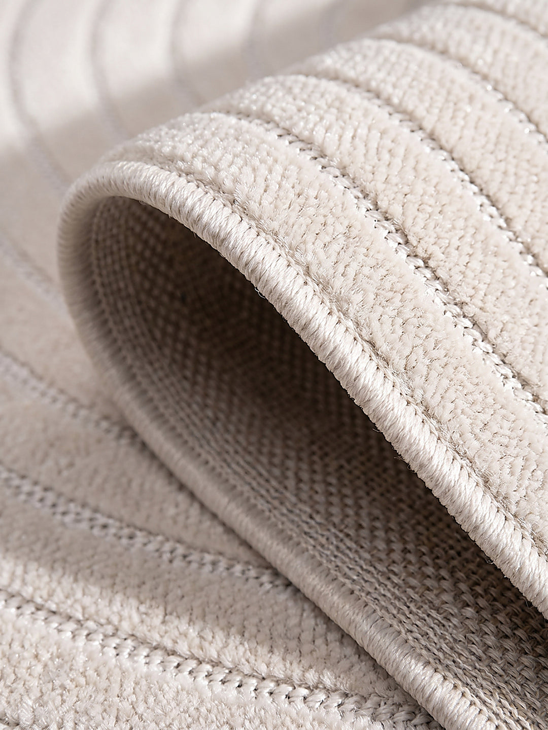 Teppich Creme Kante Verarbeitung_