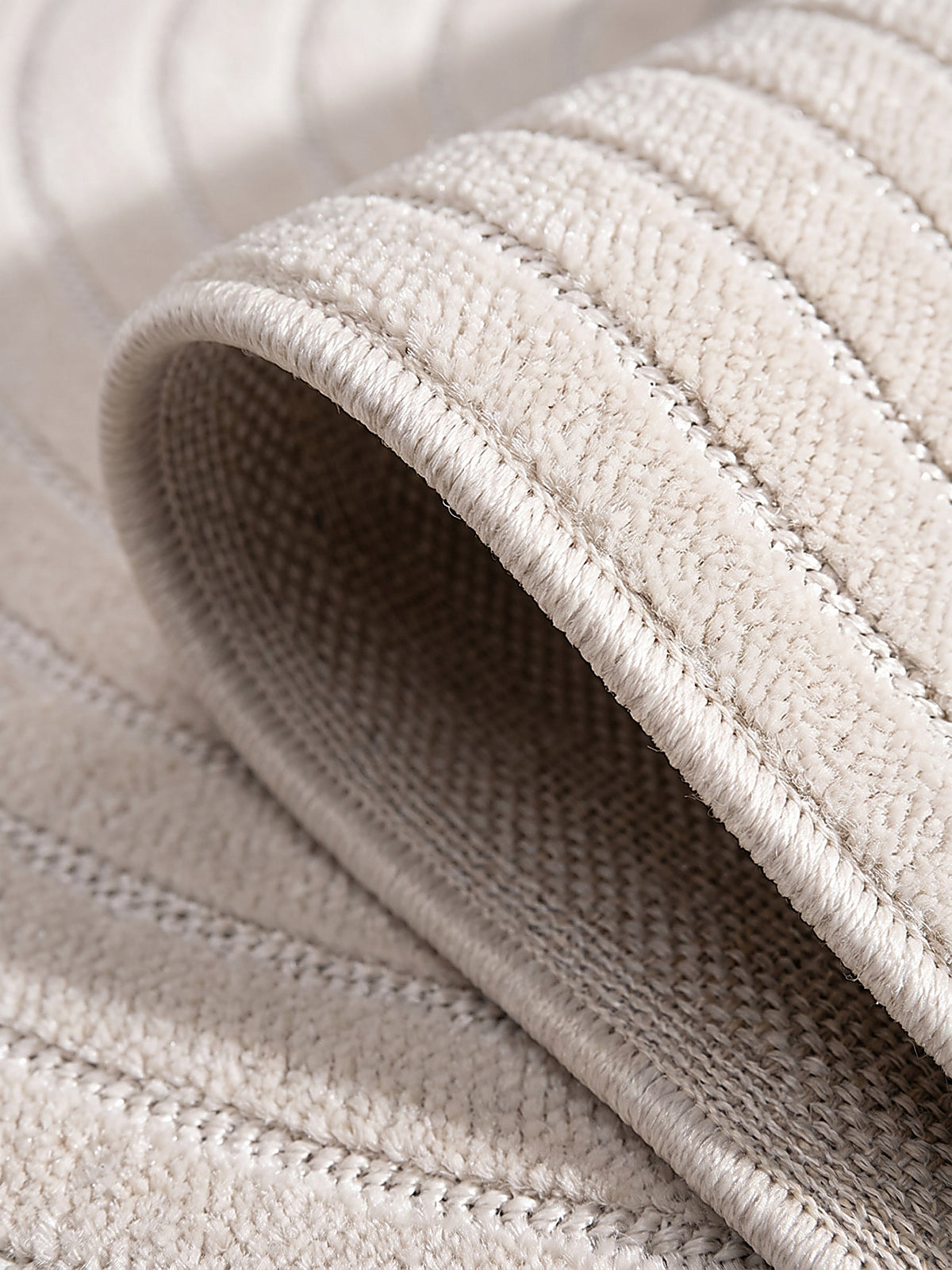 Teppich Creme Kante Verarbeitung_