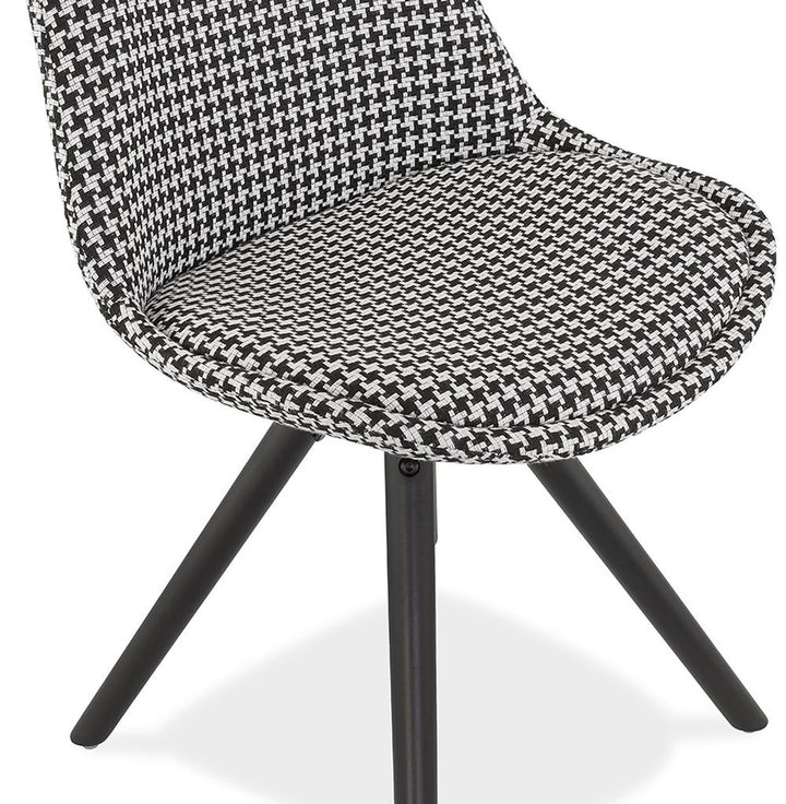 Polsterstuhl mit Retro-Muster - schwarze Holzbeine - ergonomische Form - stilvoller Essbereich von Kadima Design_