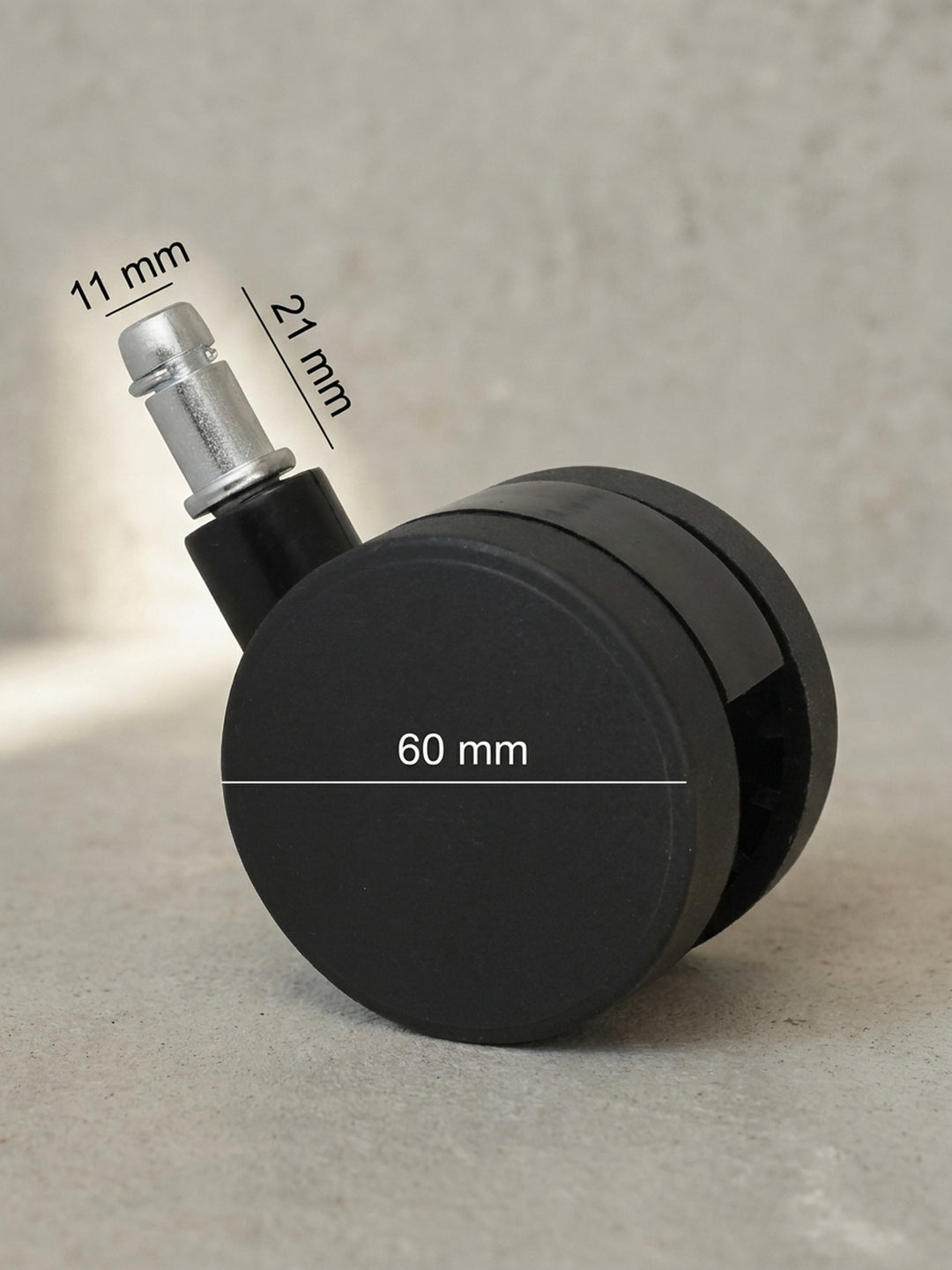 Technische Bemaßung der Bürostuhlrolle mit präzisen Angaben zum 60mm Raddurchmesser sowie dem 11mm breiten und 21mm langen Verbindungsstift._