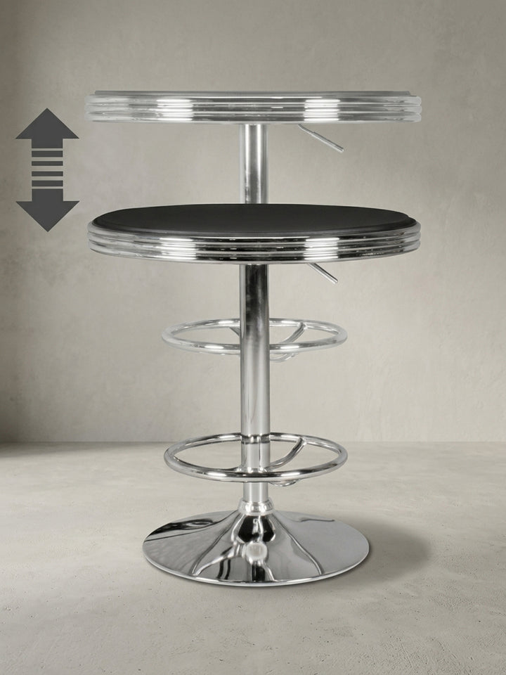 Seitenprofil des höhenverstellbaren Stehtisches. Deutlich erkennbar ist die schlanke Aluminiumsäule mit dem massiven Trompetenfuß, der dem schwarzen Diner-Tisch sicheren Stand verleiht._