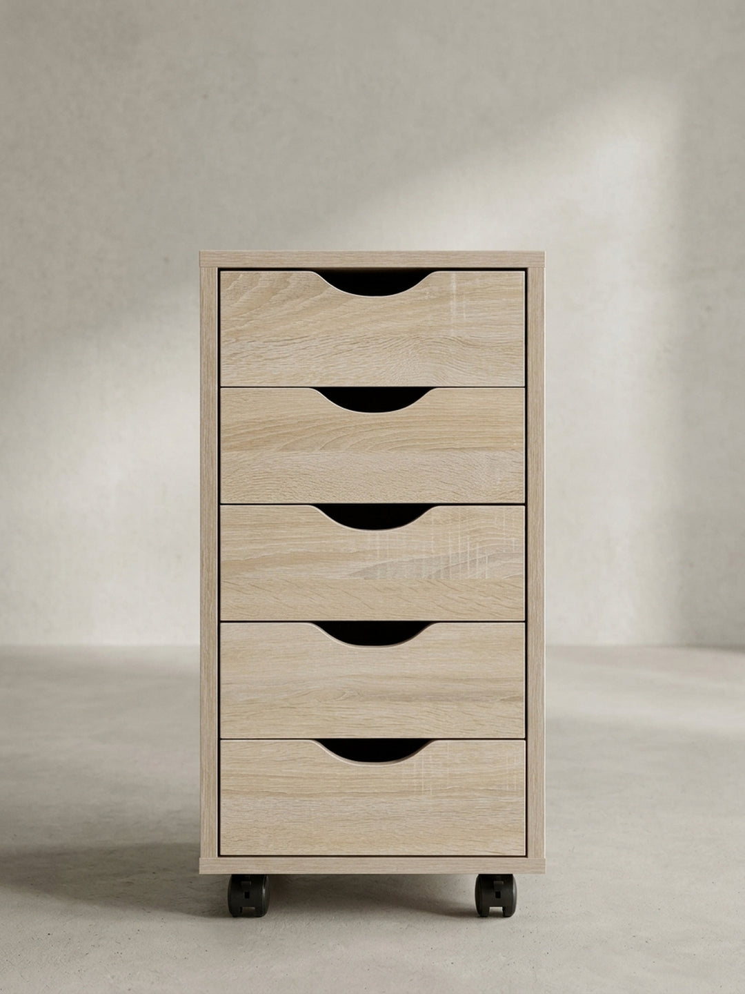 Schrägansicht des funktionalen Bürocontainers in heller Holzfarbe zeigt die puristische Silhouette und die integrierten Griffaussparungen._