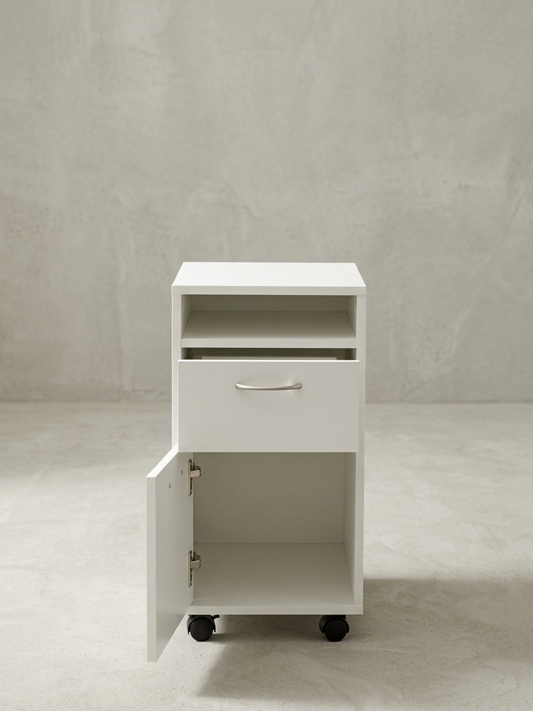 Gesamtübersicht des 33x63x38 cm großen Rollcontainers in Weiß. Ein funktionaler und stilvoller Schubladenschrank auf Rollen zur optimalen Organisation im modernen Home Office._