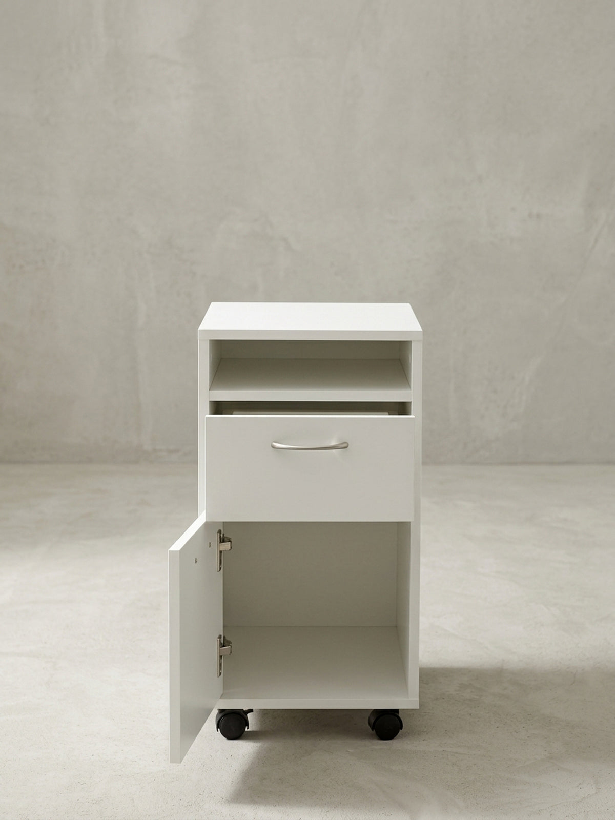 Gesamtübersicht des 33x63x38 cm großen Rollcontainers in Weiß. Ein funktionaler und stilvoller Schubladenschrank auf Rollen zur optimalen Organisation im modernen Home Office._