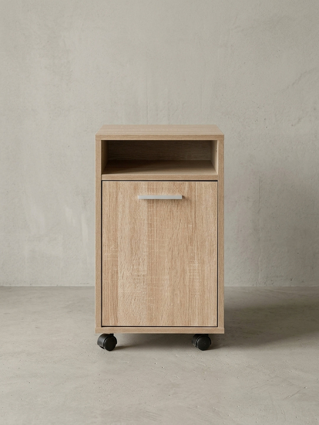 Kompakter Rollcontainer Sonoma Eiche in Frontansicht. Der Büroschrank misst 33x38x60cm und bietet ein offenes Fach sowie eine Tür für optimale Stauraum-Organisation im Arbeitszimmer._