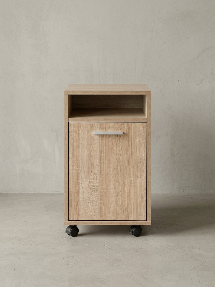 Kompakter Rollcontainer Sonoma Eiche in Frontansicht. Der Büroschrank misst 33x38x60cm und bietet ein offenes Fach sowie eine Tür für optimale Stauraum-Organisation im Arbeitszimmer._