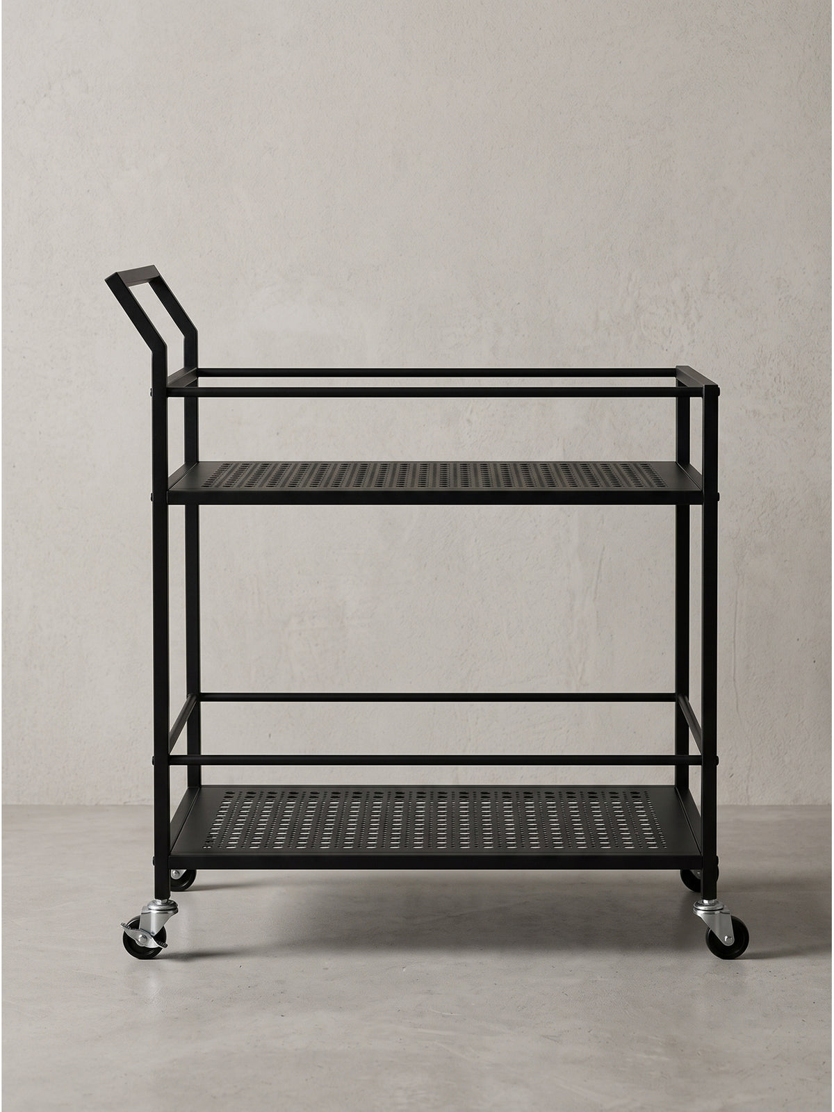 Seitenansicht des geradlinigen Eisen-Servierwagens 79x45x83 cm mit asymmetrischem Griff für das Home Office.
