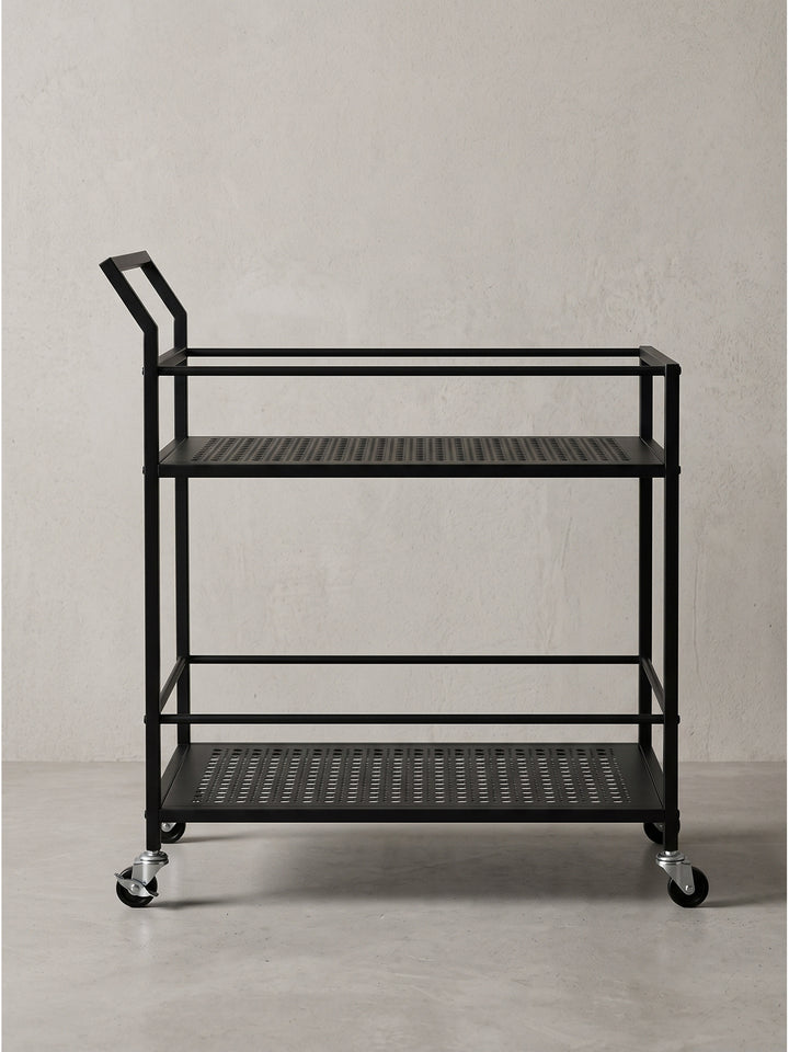 Seitenansicht des geradlinigen Eisen-Servierwagens 79x45x83 cm mit asymmetrischem Griff für das Home Office._