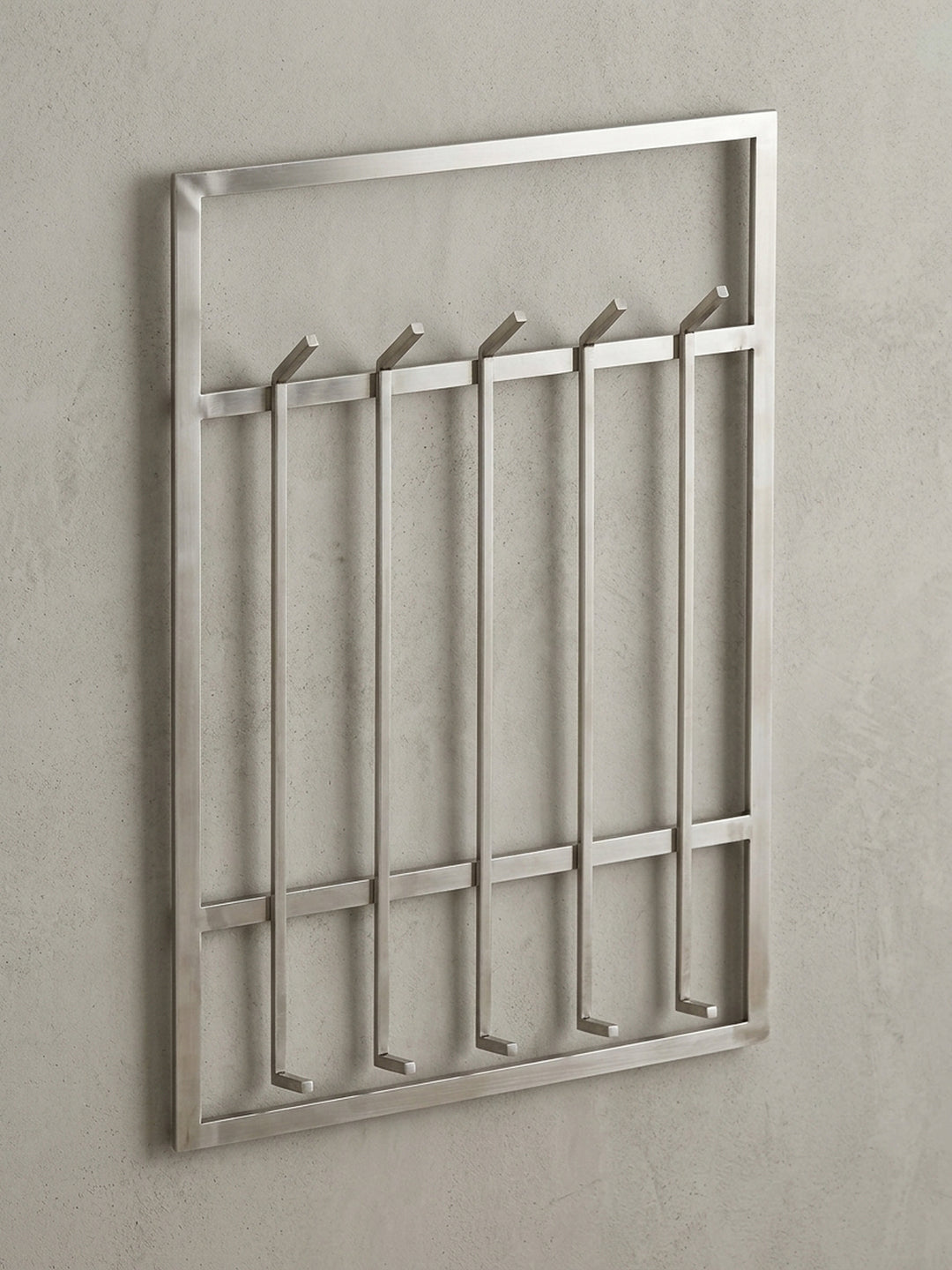 Frontalansicht der Wandgarderobe aus Stahl, 60x100 cm, auf weißem Hintergrund, die das klare, symmetrische Design mit zehn Haken perfekt zur Geltung bringt._