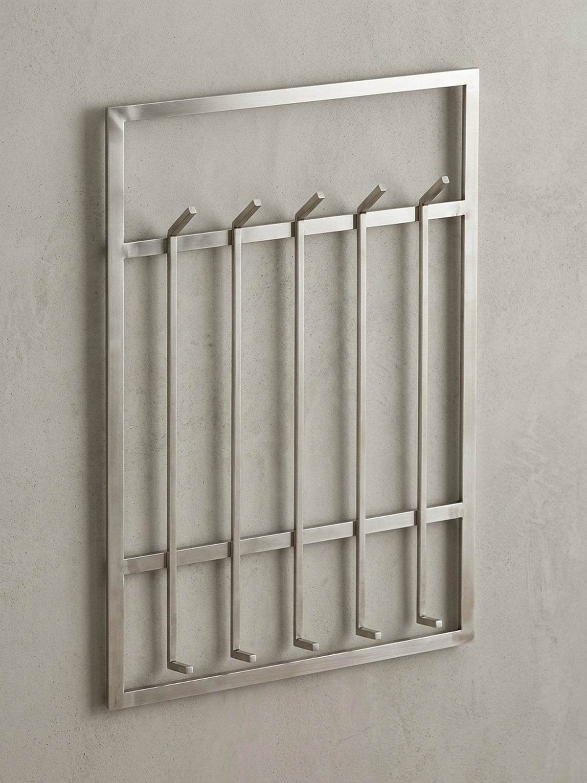 Frontalansicht der Wandgarderobe aus Stahl, 60x100 cm, auf weißem Hintergrund, die das klare, symmetrische Design mit zehn Haken perfekt zur Geltung bringt.